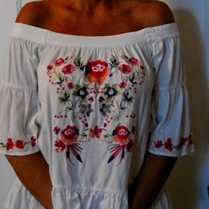 Cool and breezy off shoulder top. Umgee L